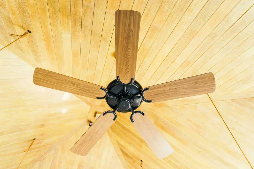 a wooden ceiling fan