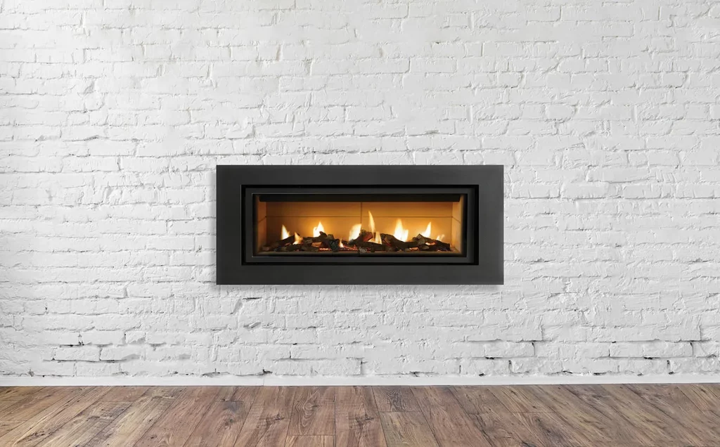 modern fireplace on white brick wall