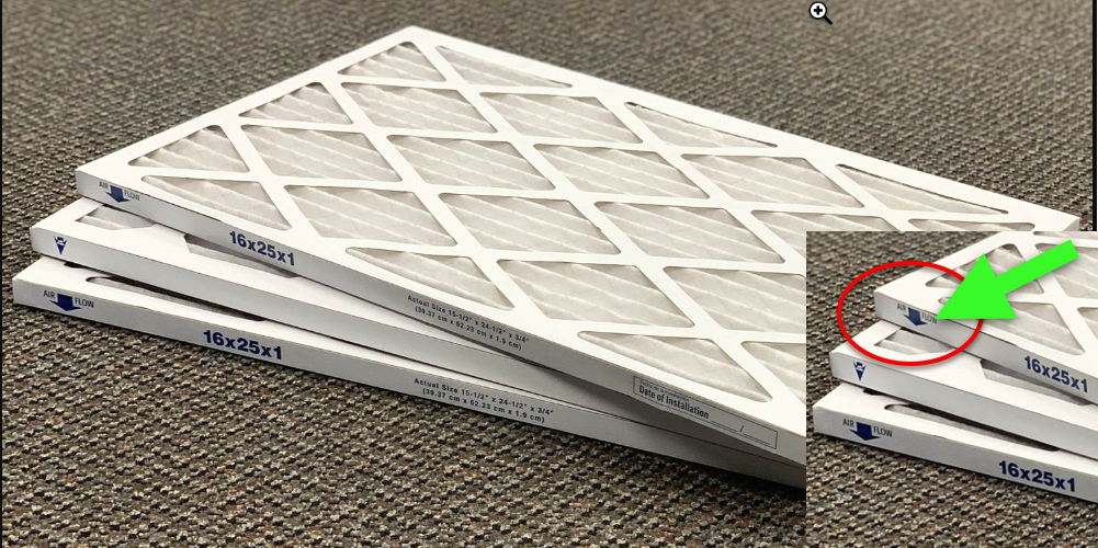 A stack of new, white furnace air filters sized 16x25x1 on a textured carpet. The top filter is fully visible, showcasing its pleated design which optimizes air flow and filtration. The filters are aligned neatly with the size label clearly visible on each spine. An arrow and circle highlight one filter in the stack, possibly indicating a feature or selection. This image is relevant for topics on home HVAC maintenance and air quality improvement.